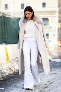 Le-Fashion-Blog-Street-Style-Fashion-Week-Neutrals-Long-Shearling-Coat-Ribbed-Sweater-White-Flared-Jeans-Via-Harpers-Bazaar-1